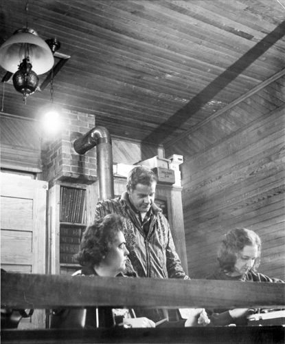 BERENICE ABBOTT Ballot Clerks Check a Voter's Name, c. 1966, vintage silver gelatin photograph, 8 x 8 inches