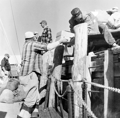 BERENICE ABBOTT The Mary A. Takes Supplies and Passengers, c. 1966, vintage silver gelatin photograph, 7 x 7 inches